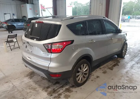 2017 Ford Escape Titanium z USA, uszkodzony, nr VIN 1FMCU9JD3HUD37432